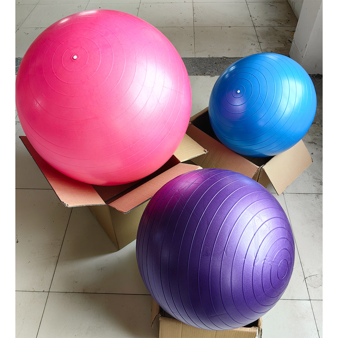 Pelota de yoga antideslizante 55 cm — con bomba, tapón y cinta de medición